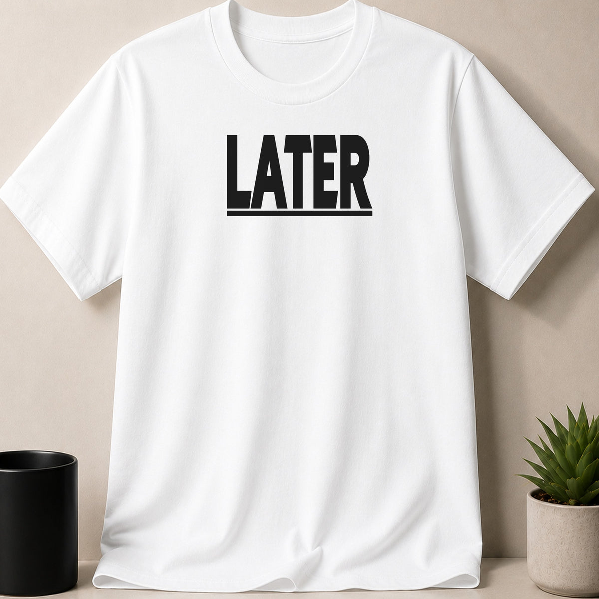 White t-shirt with black "LATER" text and an underline.