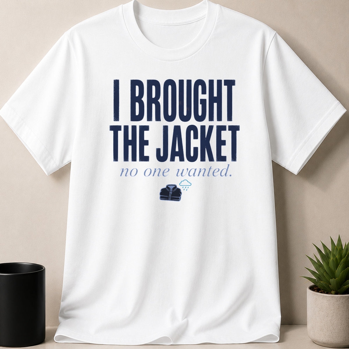 White t-shirt with "I BROUGHT THE JACKET no one wanted" and jacket graphic.