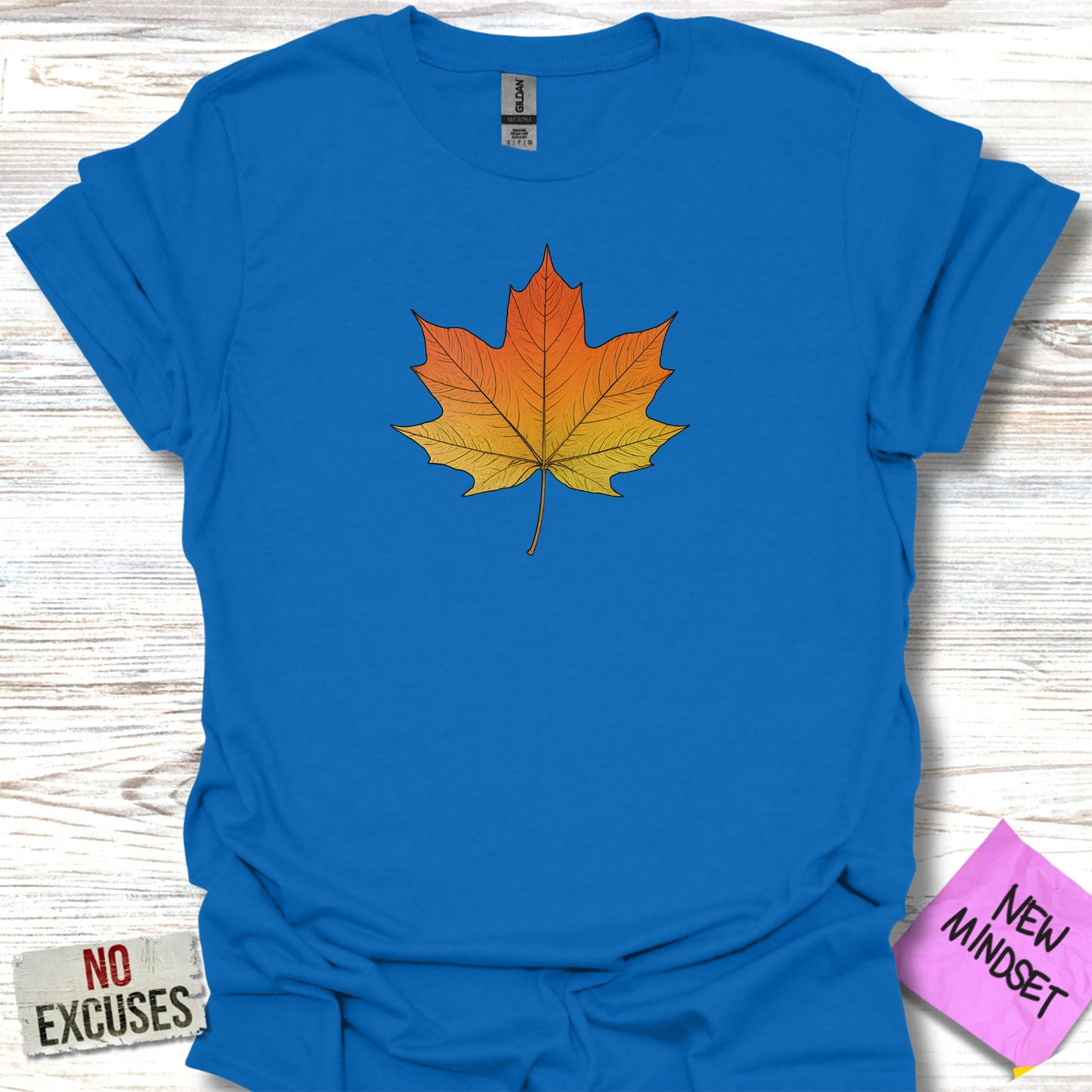 Vibrant Autumn Maple Leaf Design on Blue Shirt product
