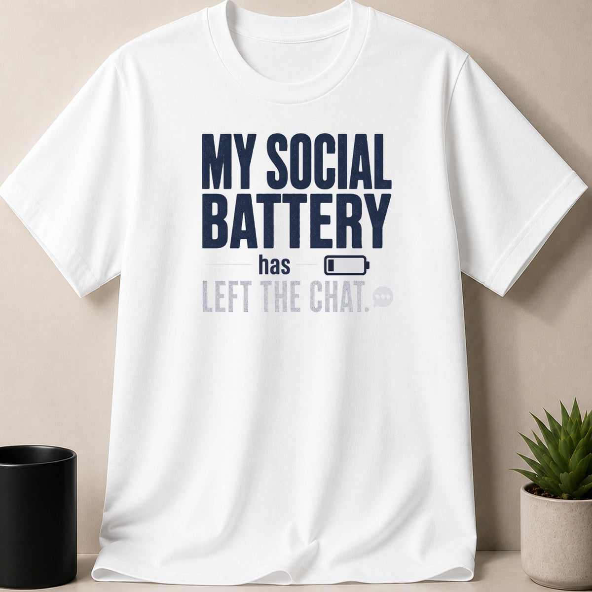 White t-shirt with "My Social Battery has left the chat" graphic.