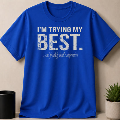 Blue t-shirt with white distressed text: "I'M TRYING MY BEST. ... and frankly that's impressive."