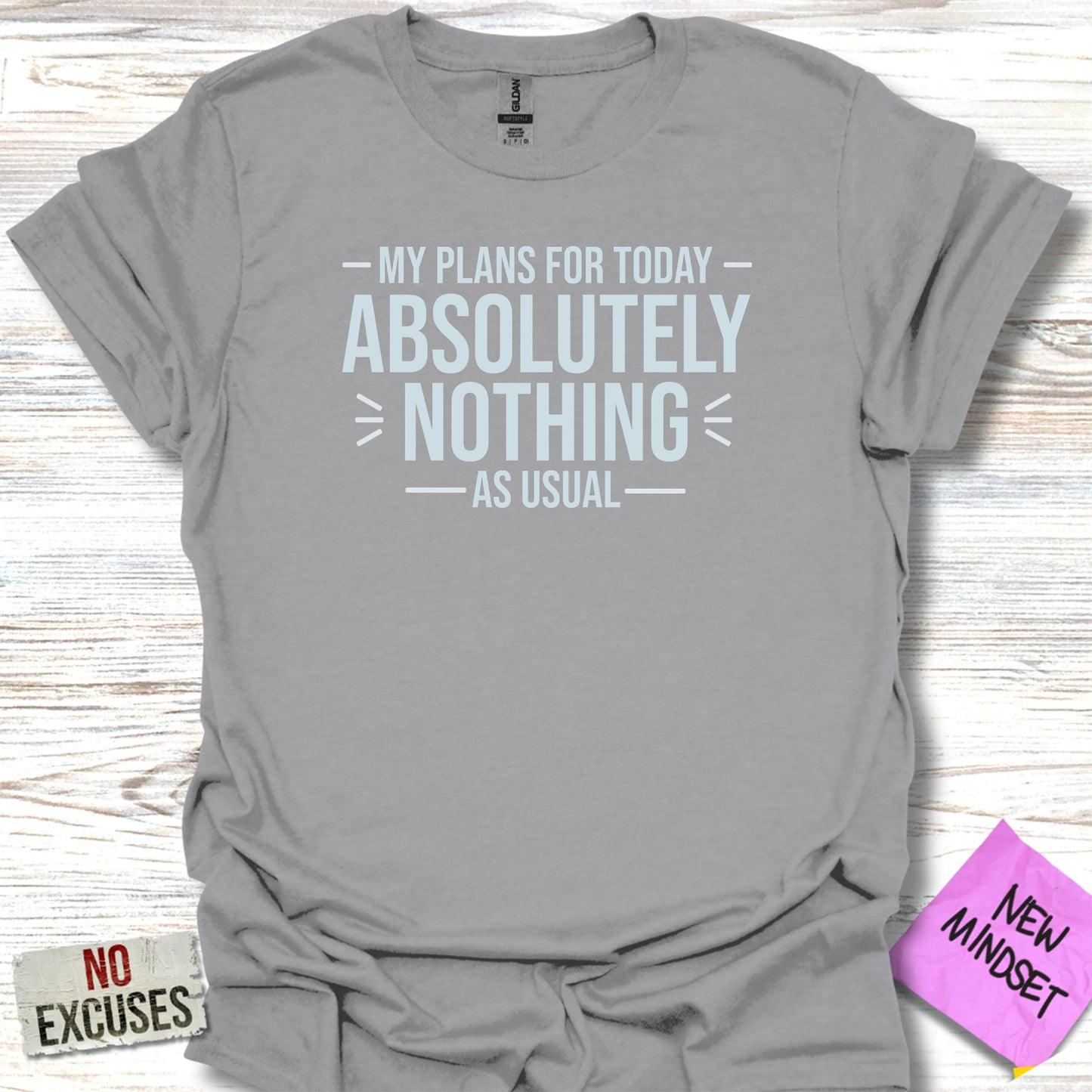 Gray t-shirt with "Absolutely Nothing" text, emphasizing "No Excuses".