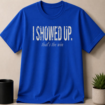 Blue t-shirt with distressed white text: "I SHOWED UP. that's the win."