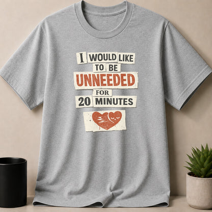 Gray t-shirt with text "I WOULD LIKE TO BE UNNEEDED FOR 20 MINUTES".
