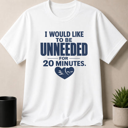 White t-shirt with navy text "I WOULD LIKE TO BE UNNEEDED FOR 20 MINUTES." and a heart graphic.