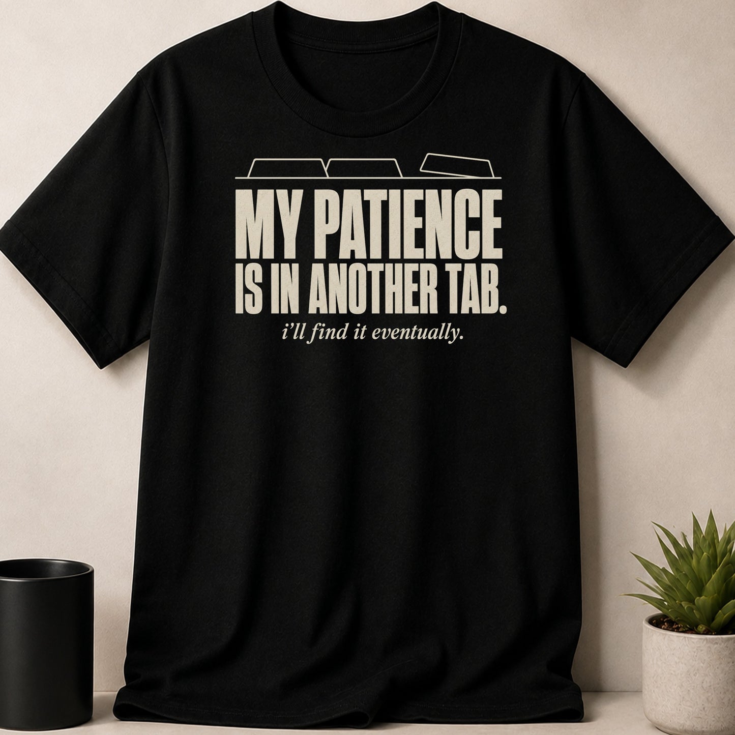 Black t-shirt with "MY PATIENCE IS IN ANOTHER TAB." and "i'll find it eventually." text.