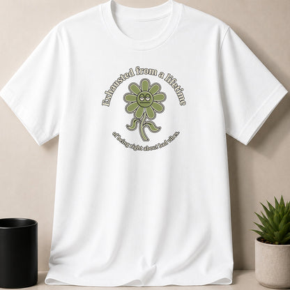 White t-shirt with a green flower graphic and text reading "Exhausted from a lifetime of being right about bad vibes."