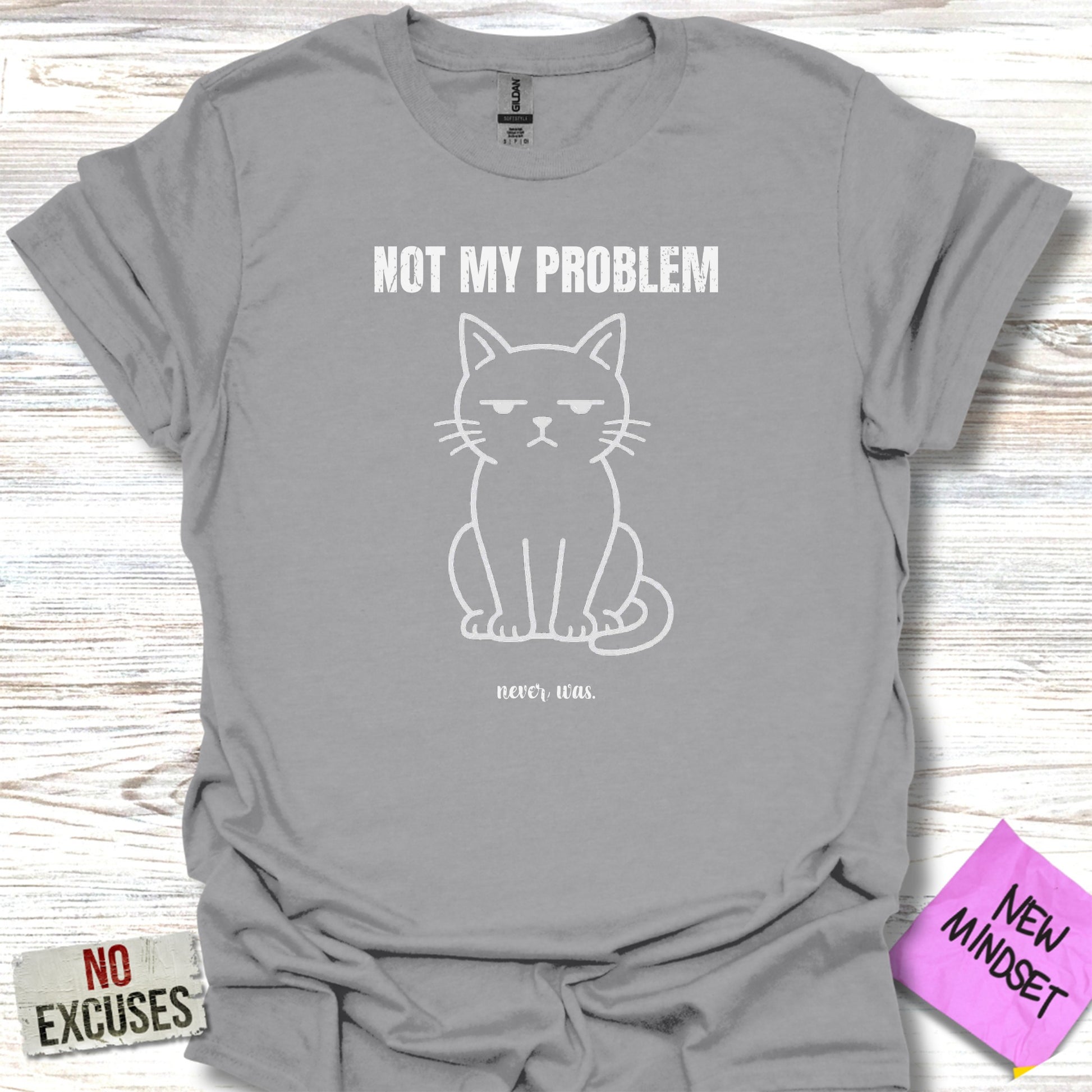 Grey t-shirt with a grumpy cat graphic and text "NOT MY PROBLEM never was."