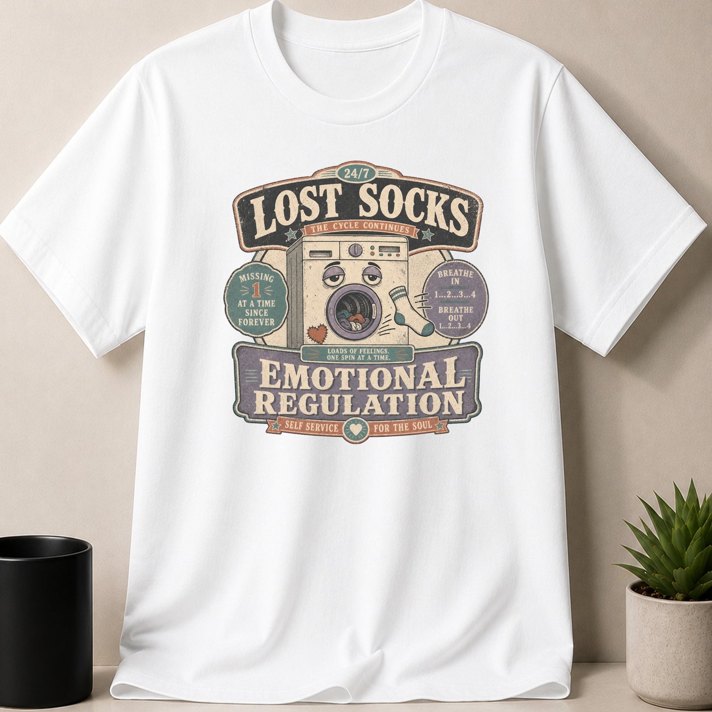 White t-shirt with Lost Socks, Emotional Regulation, dryer, and breathing graphic.