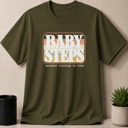 Olive green t-shirt with "BABY STEPS because running is rude" graphic.