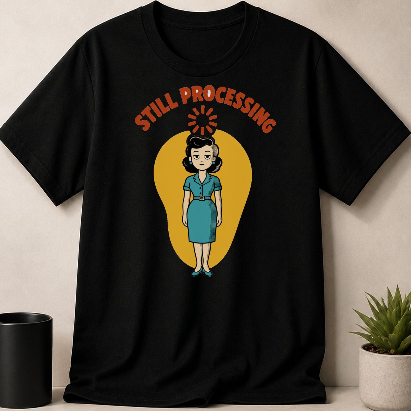Black t-shirt with cartoon woman and text "STILL PROCESSING"