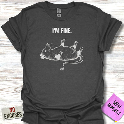 Dark gray t-shirt with a white graphic of a rat lying on its back and text "I'M FINE. see?"