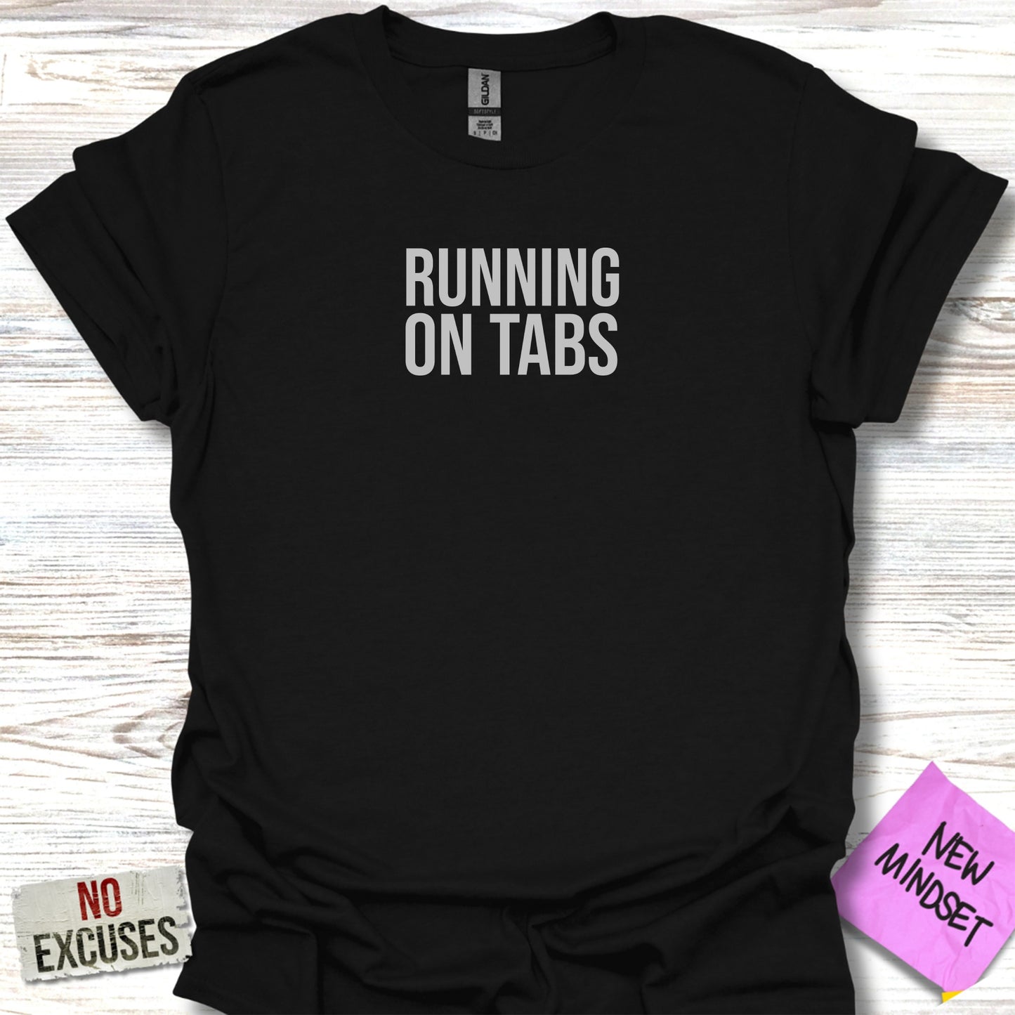 Black t-shirt with "RUNNING ON TABS" and "NEW MINDSET" text.