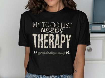 Black t-shirt with "My To-Do List Needs Therapy" and "apparently color coding was not enough" text.