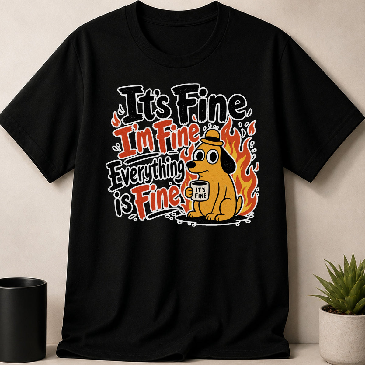 Black t-shirt with a dog sitting in flames, holding a mug that says "IT'S FINE".