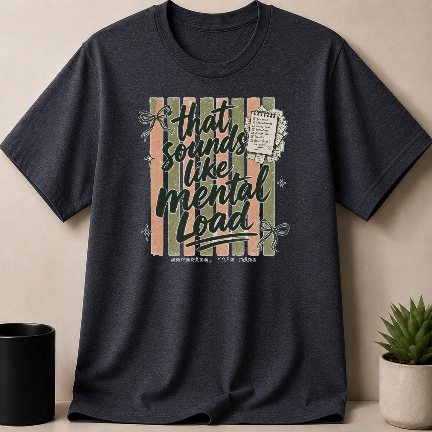 T-shirt with "that sounds like mental load, surprise it's mine" text and to-do list graphic.