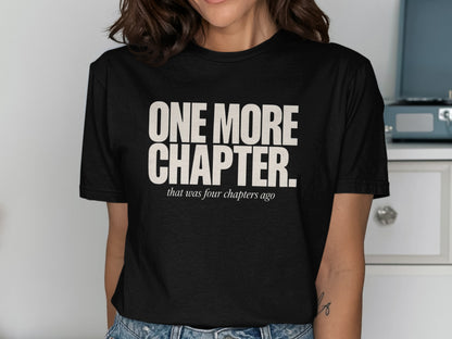 Black t-shirt with "ONE MORE CHAPTER. that was four chapters ago" text