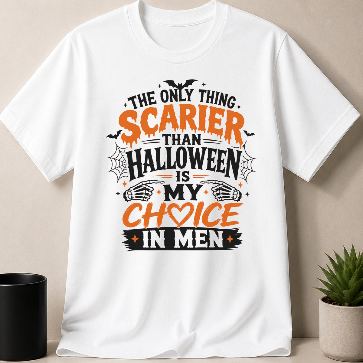 White t-shirt with Halloween graphic text: "The only thing scarier than Halloween is my choice in men."