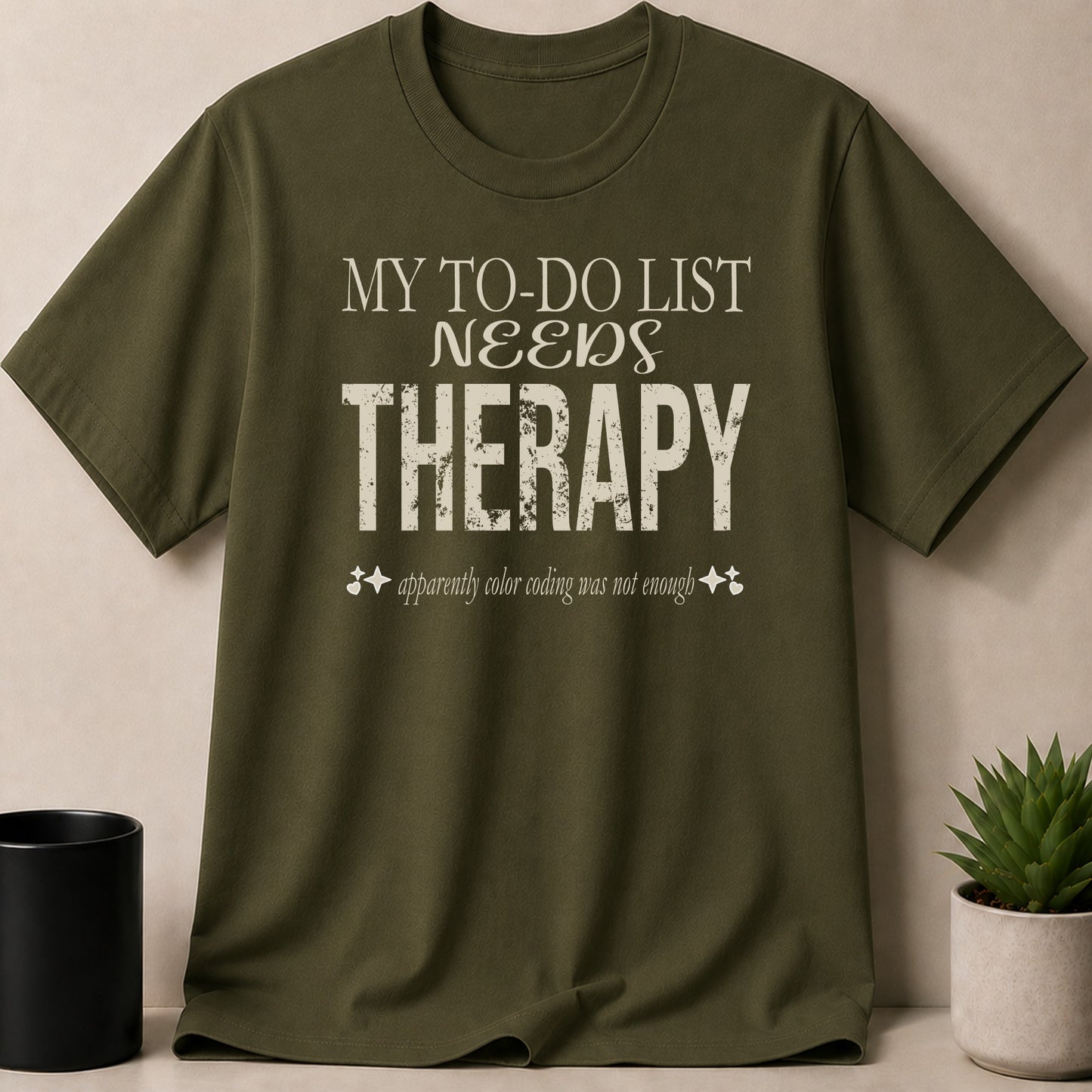 Olive green t-shirt with text "MY TO-DO LIST NEEDS THERAPY"