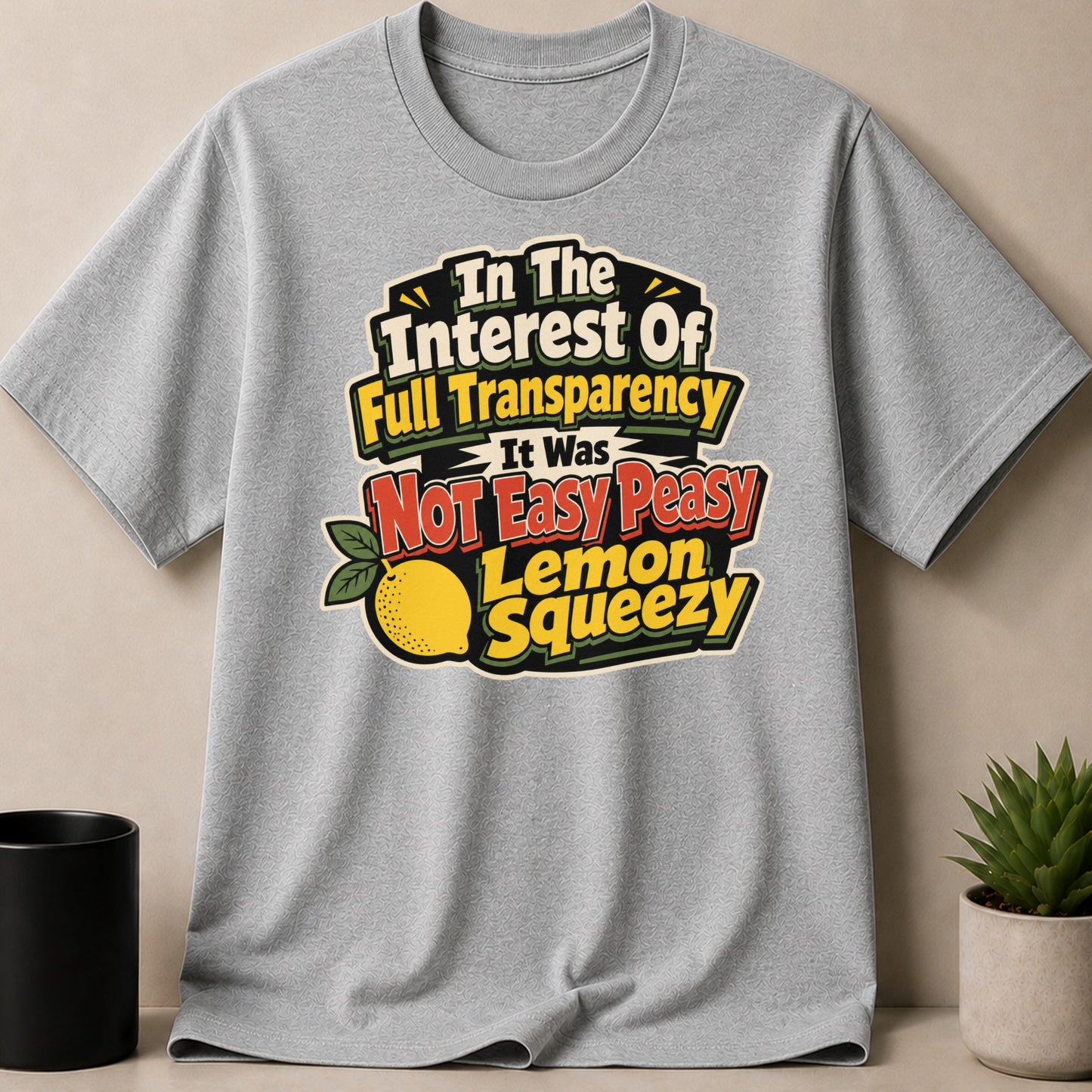 Grey t-shirt with "In The Interest Of Full Transparency It Was Not Easy Peasy Lemon Squeezy" text.