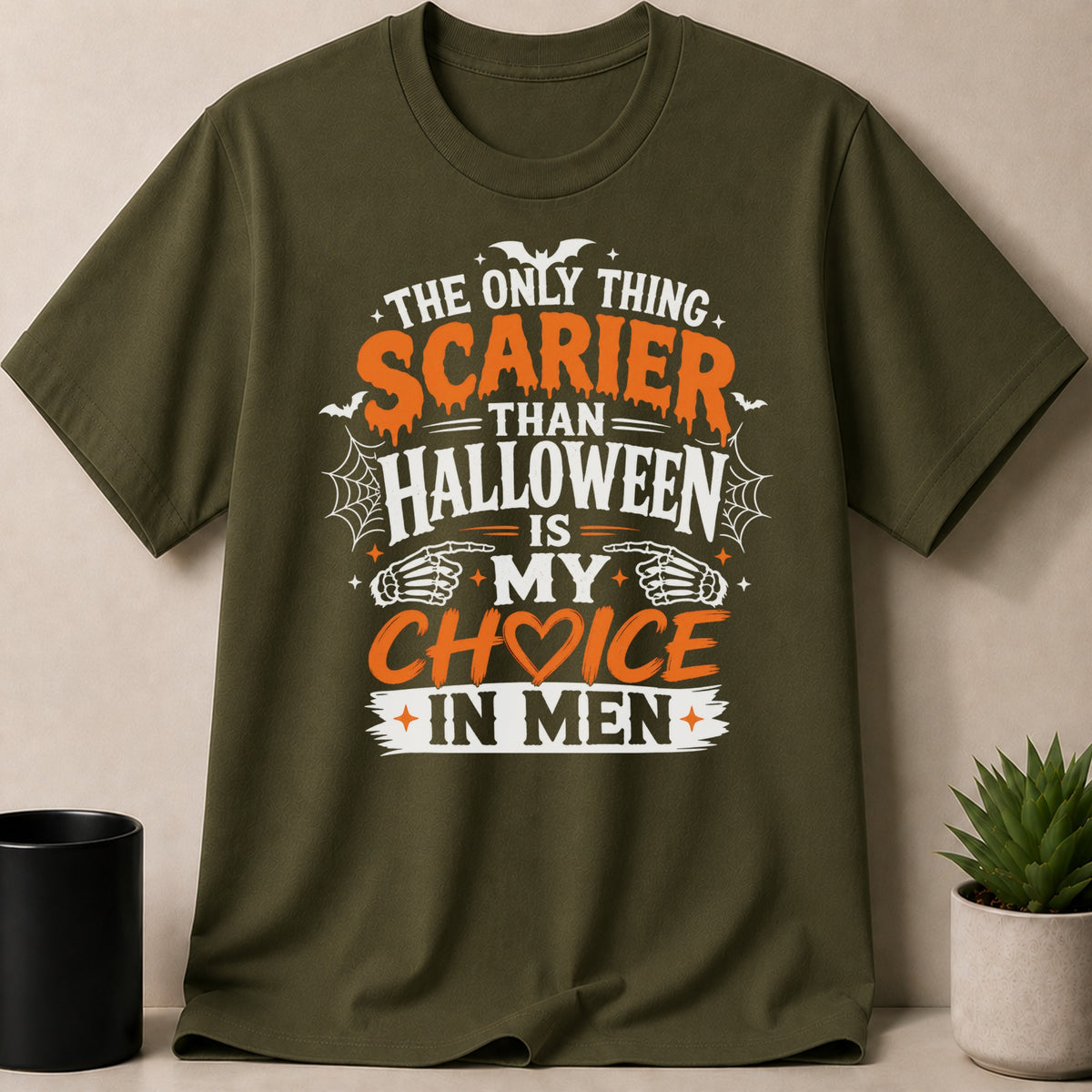 Olive green t-shirt with text: "The only thing scarier than Halloween is my choice in men."