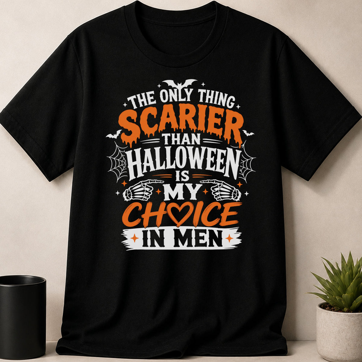 Black t-shirt with the text "The only thing scarier than Halloween is my choice in men."
