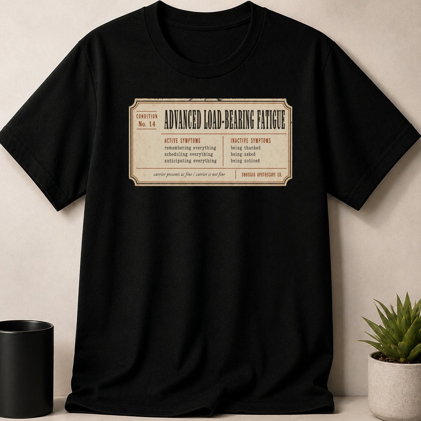 Black t-shirt with "Advanced Load-Bearing Fatigue" ticket design.