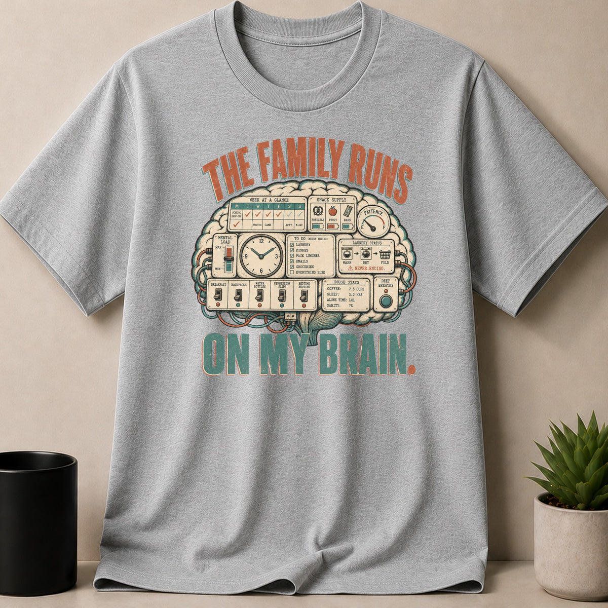 Gray t-shirt with "The family runs on my brain" text and brain graphic.