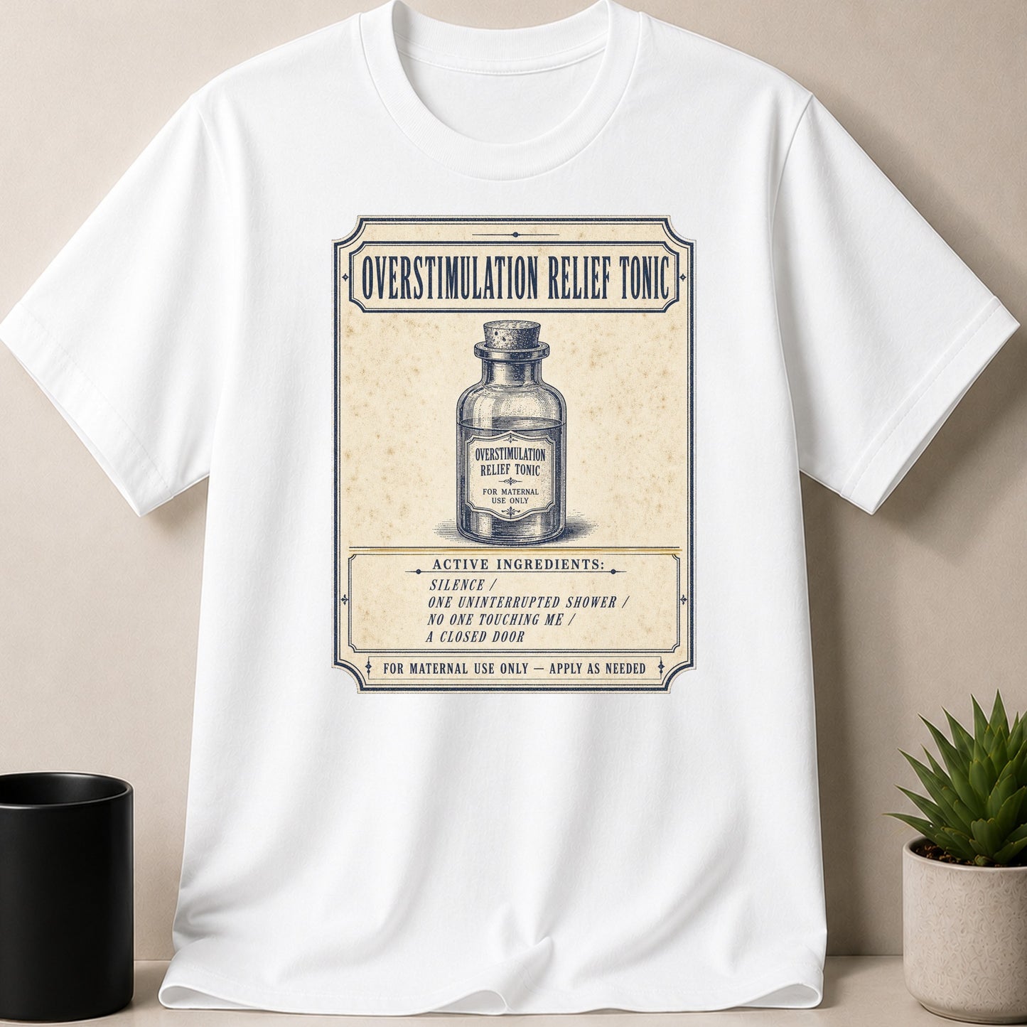 White t-shirt with a vintage label design for "Overstimulation Relief Tonic".