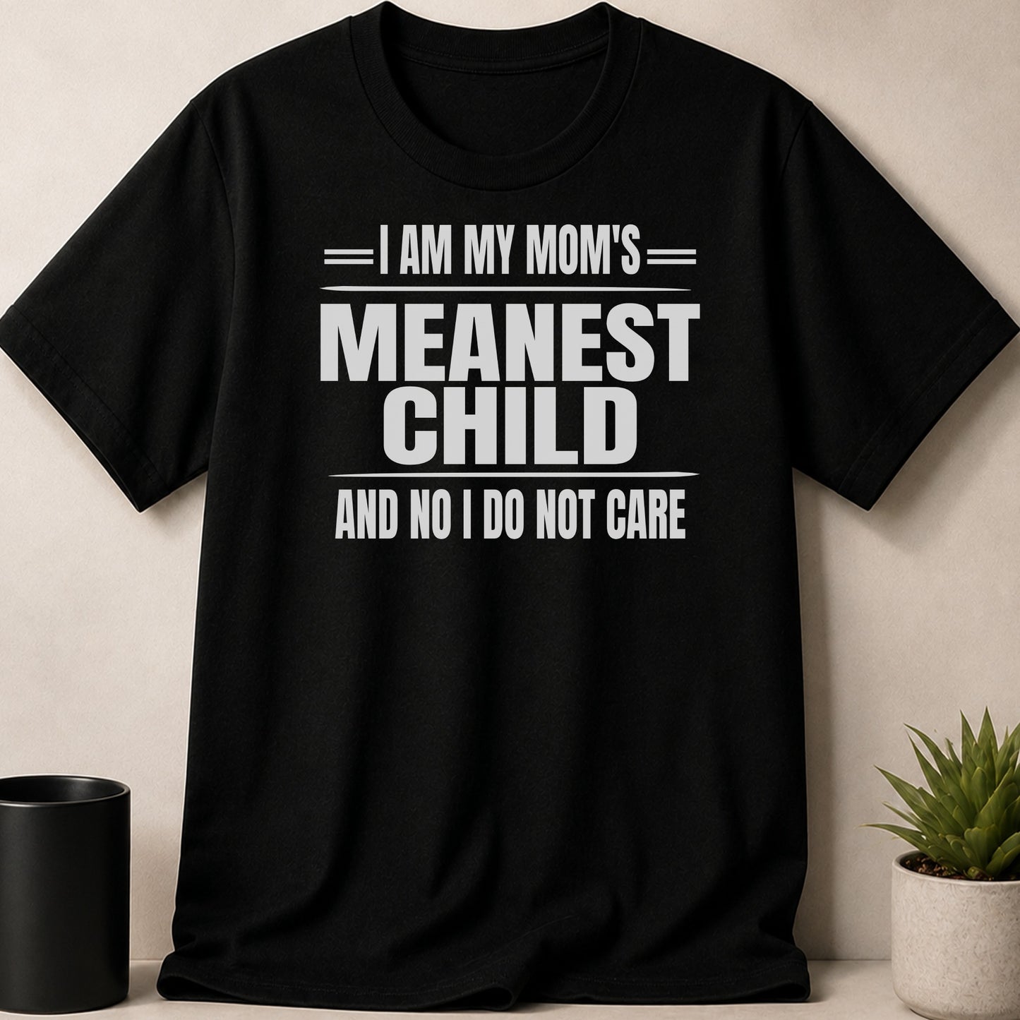 Black t-shirt with white text "I AM MY MOM'S MEANEST CHILD AND NO I DO NOT CARE".