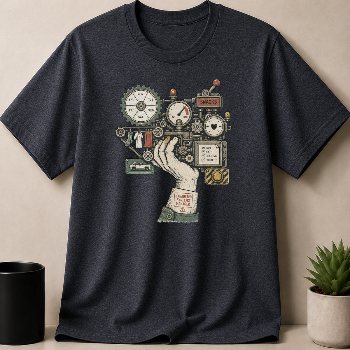 Dark Heather t-shirt — T-shirt graphic featuring a hand operating complicated machinery, lists "Exhausted Systems Manager."