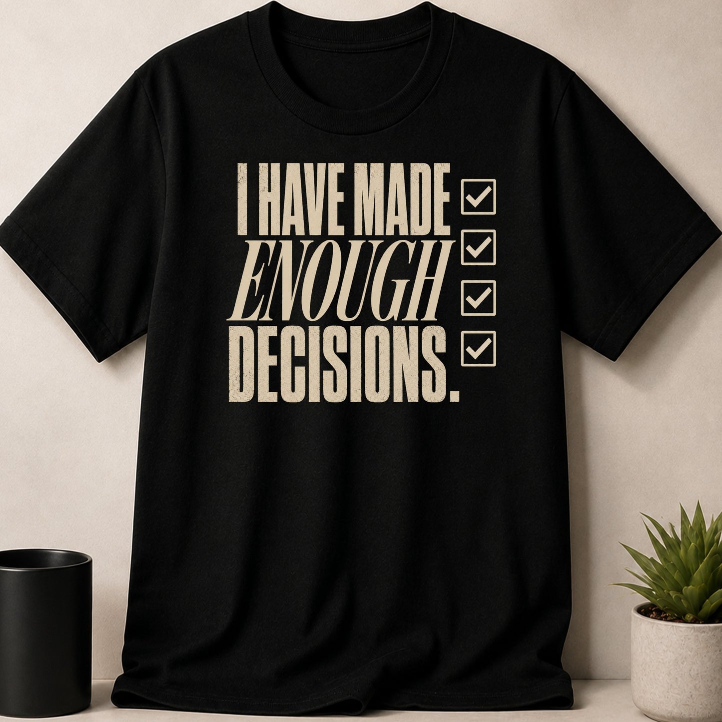 Black t-shirt with text "I HAVE MADE ENOUGH DECISIONS." and checkmarks.
