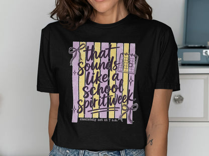 Black t-shirt graphic reads "that sounds like a school spirit week" with calendar icon and bows.