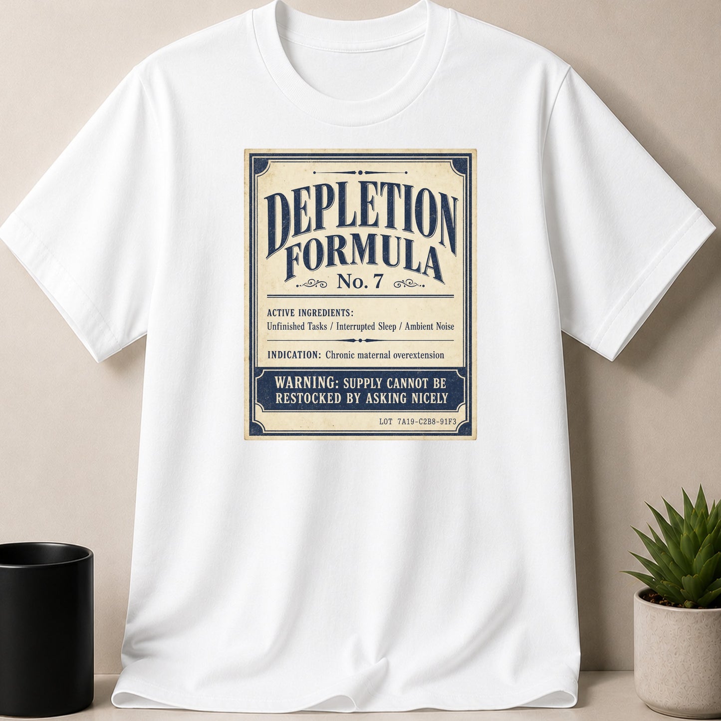 White t-shirt with "Depletion Formula No. 7" design listing ingredients and warnings.