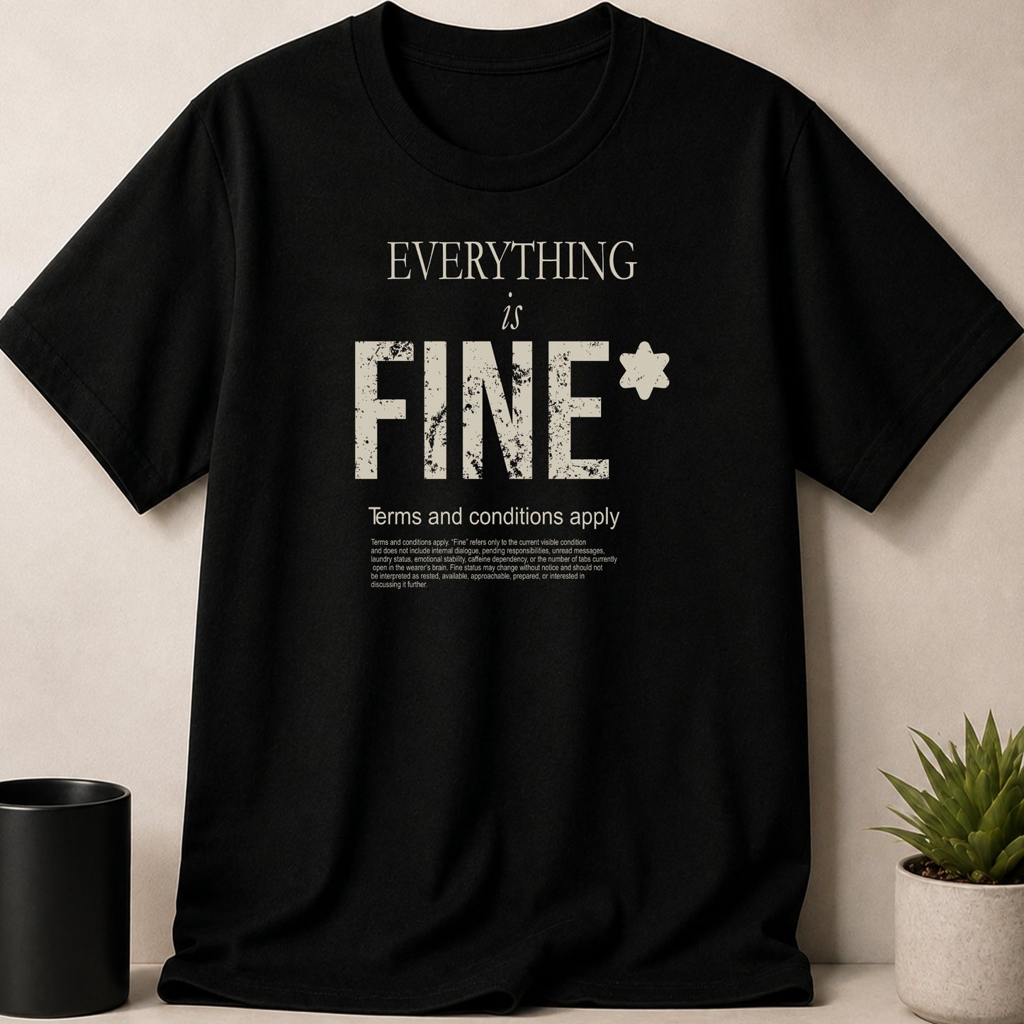 Black t-shirt with "EVERYTHING is FINE* Terms and conditions apply" text.