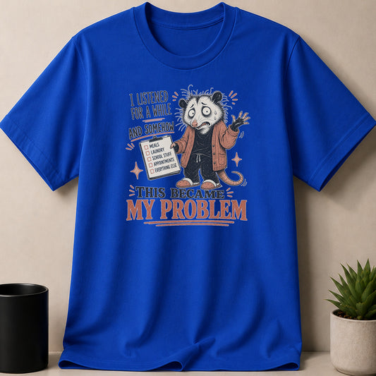 Blue t-shirt with distressed graphic of an opossum holding a checklist and text "This Became My Problem".