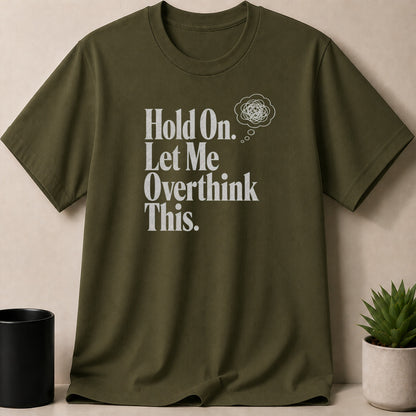 Olive green t-shirt with white text "Hold On. Let Me Overthink This."