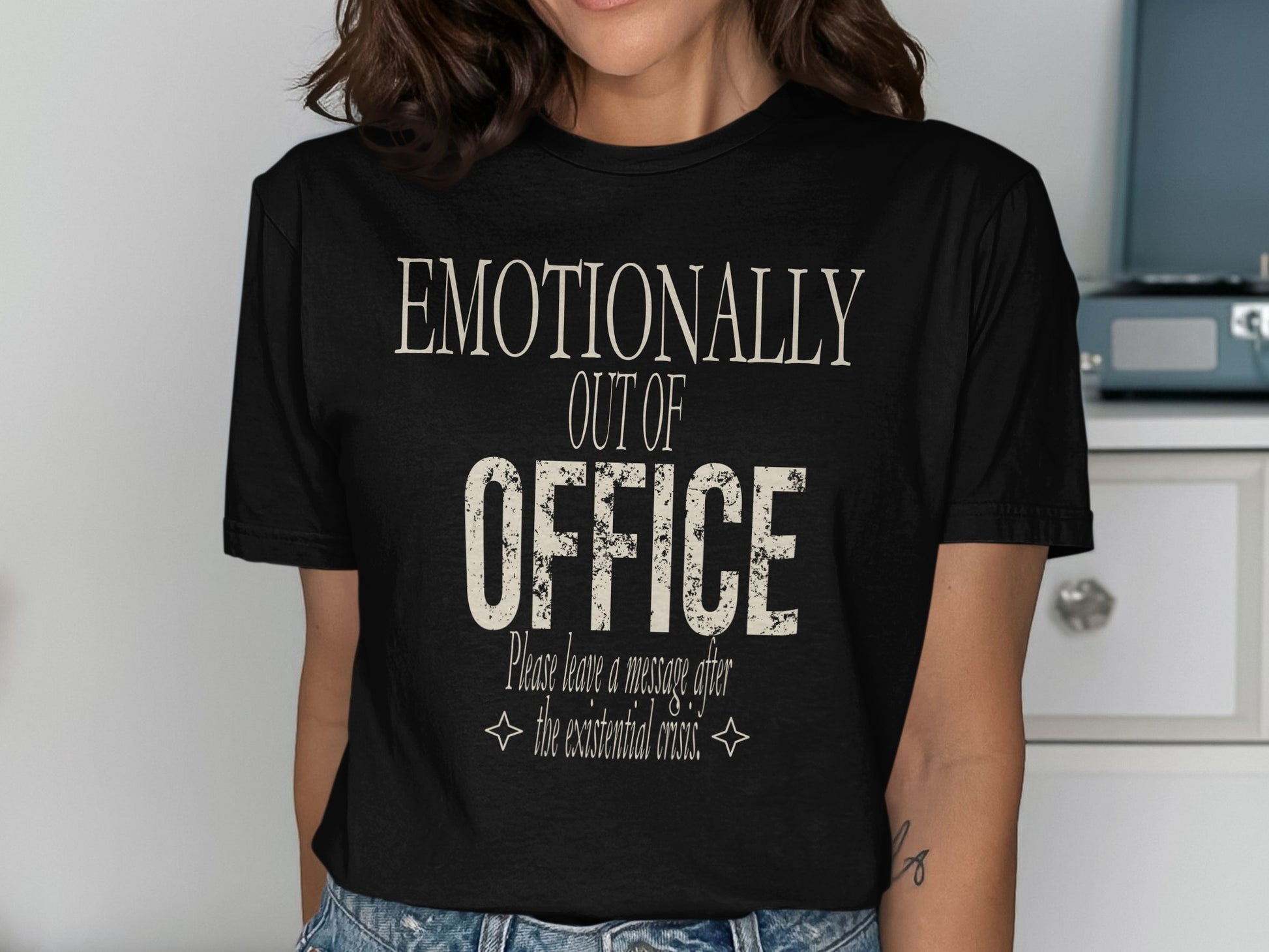 T-shirt with text: Emotionally Out Of Office. Please leave a message after the existential crisis.