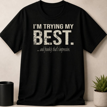 Black t-shirt with distressed text "I'M TRYING MY BEST. ...and frankly that's impressive."