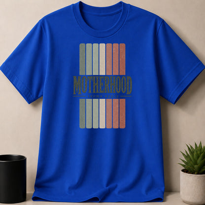 Royal blue t-shirt with "Motherhood" and "terms apply" text in a vintage style.