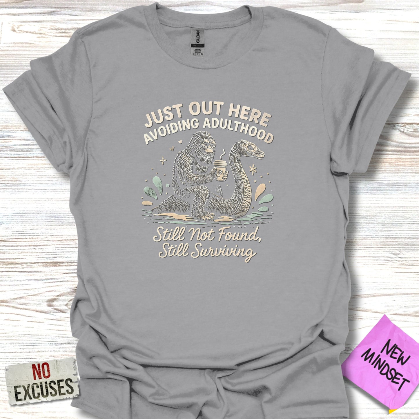 Just Out Here Avoiding Adulthood Graphic T-Shirt Product