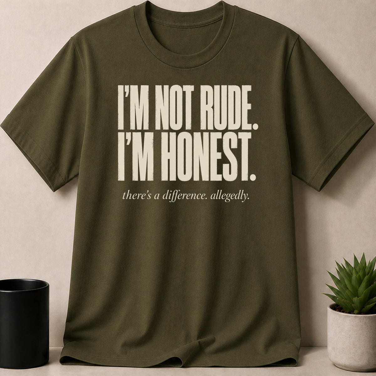 Olive green t-shirt with "I'm Not Rude. I'm Honest. there's a difference. allegedly." text.